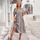 Diyun independently developed and designed a printed V-neck short-sleeved vacation dress for summer 2025 European and American women's clothing export
