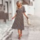 Diyun independently developed and designed a printed V-neck short-sleeved vacation dress for summer 2025 European and American women's clothing export